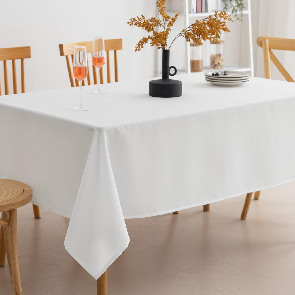 Amazon Basics Thin Rectangle Tablecloth, Water-Resistant Textured Fabric, Wrinkle Resistant, Washable Decorative Table Cover for Dining, Parties, 60" x 84", White, Pack of 1