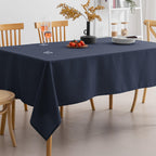 Amazon Basics Thin Rectangle Tablecloth, Water-Resistant Textured Fabric, Wrinkle Resistant, Washable Decorative Table Cover for Dining, Parties, 60" x 84", White, Pack of 1